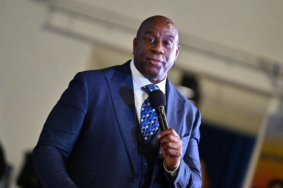 ATLANTA, GEORGIA - MARCH 17: Magic Johnson speaks during the 2023 International Poverty Forum at Delta Flight Museum on March 17, 2023 in Atlanta, Georgia. (Photo by Derek White/Getty Images)