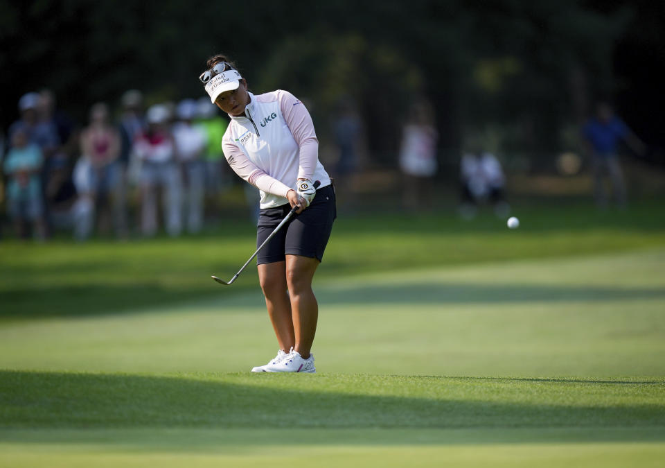 Megan Khang, of the United States, chips onto the seventh green during the final round of the CPKC Women’s Open golf tournament Sunday, Aug. 27, 2023, in Vancouver, British Columbia. (Darryl Dyck/The Canadian Press via AP)