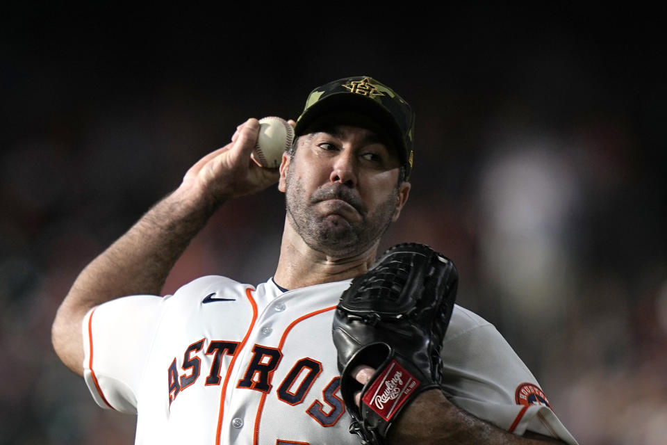 Houston Astros starting pitcher Justin Verlander throws during the first inning of a baseball game against the Texas Rangers Saturday, May 21, 2022, in Houston. (AP Photo/David J. Phillip)