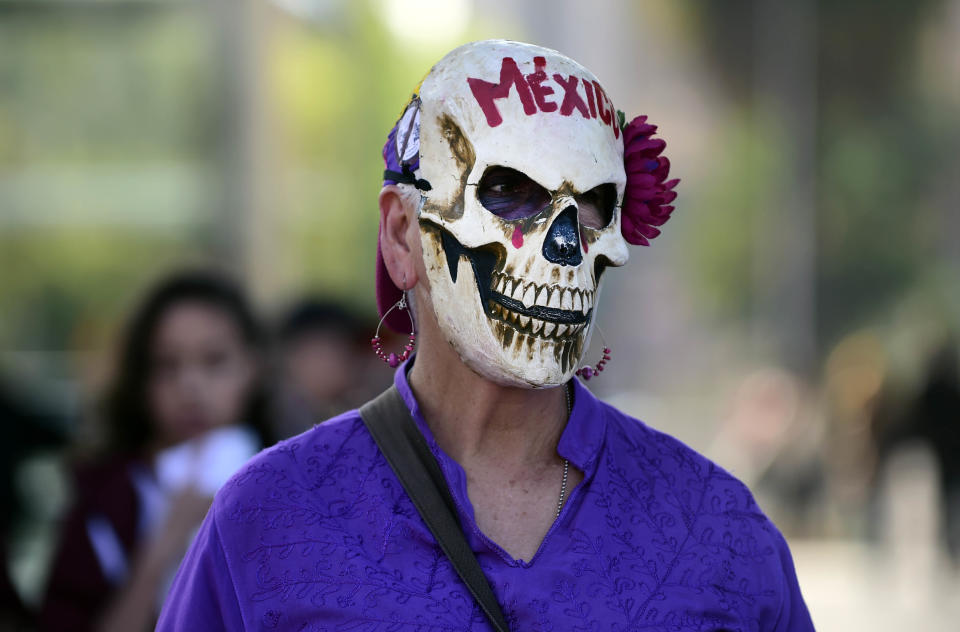 A woman takes part in protests against violence against women in Mexico City.