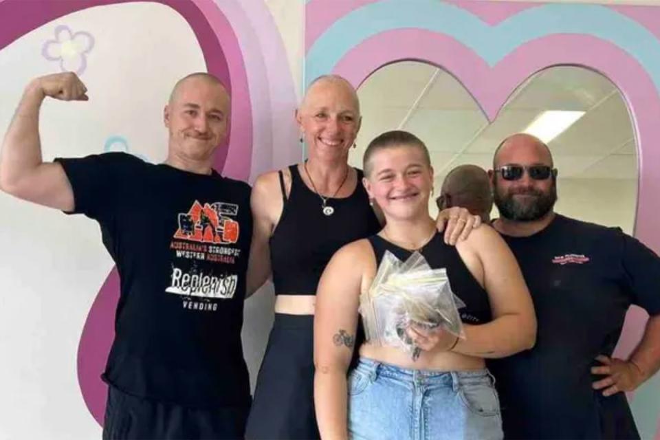 <p>Go Fund Me</p> The Mulcahy family shaved their head in solidarity for mom, Tracy, who is undergoing chemotherapy for ovarian cancer