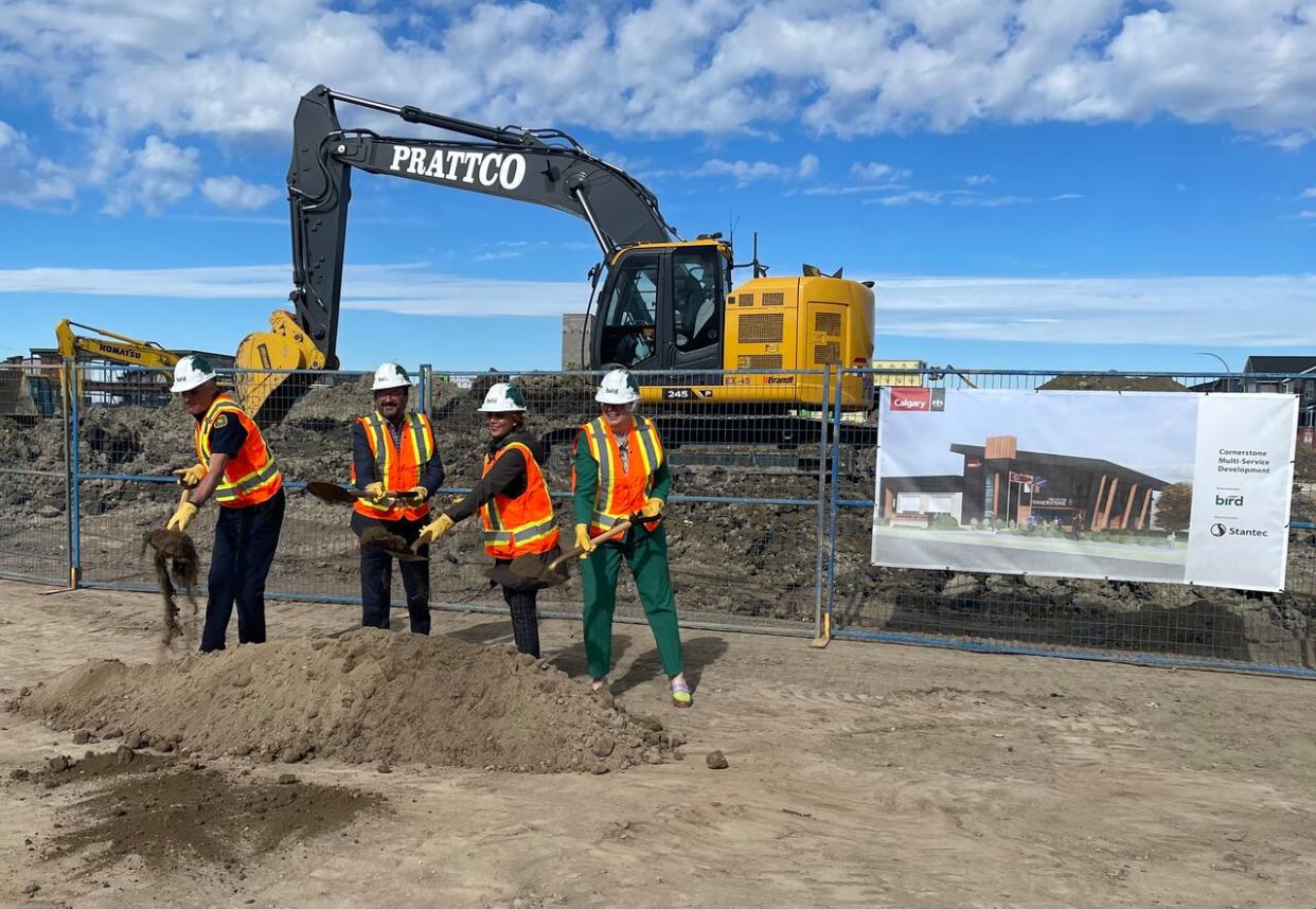 Calgary fire Chief Steve Dongworth, Ward 5 Coun. Raj Dhaliwal, Mayor Jyoti Gondek and the city’s general manager of community services, Katie Black, at Wednesday’s groundbreaking for a new fire station in the northeast. (Scott Dippel/CBC - image credit)