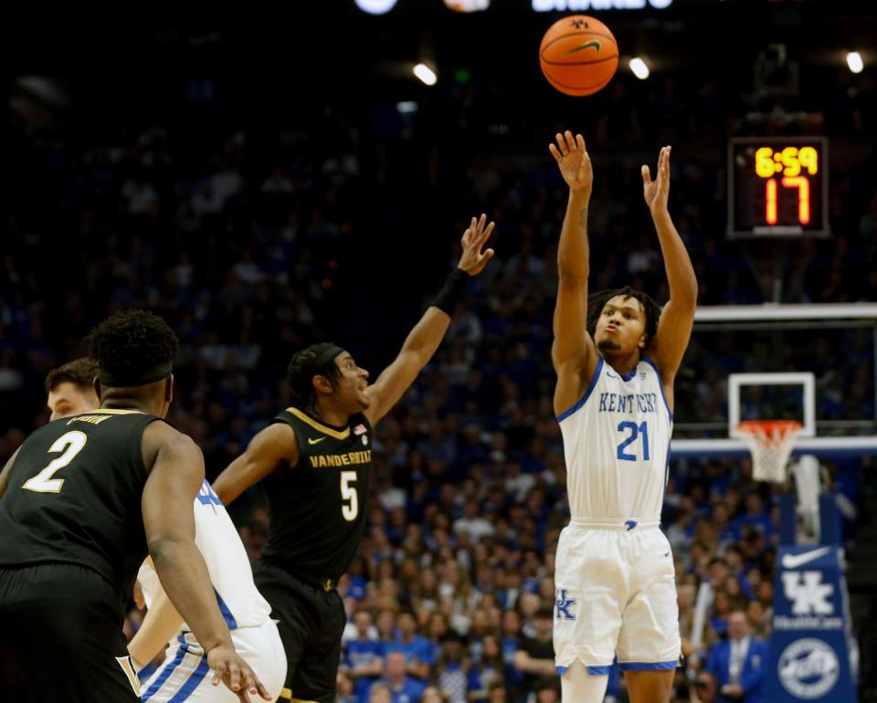 Kentucky guard D.J. Wagner makes a 3-pointer against Vanderbilt guard Ezra Manjon during the first half Wednesday night.