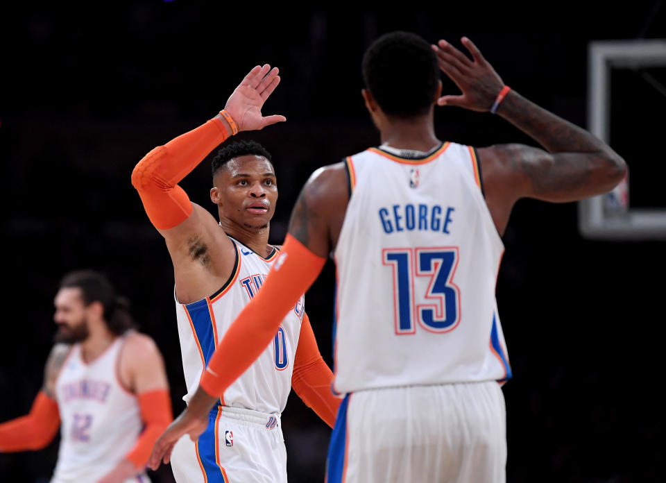 Russell Westbrook and Paul George will face their former team from different cities. (Getty)