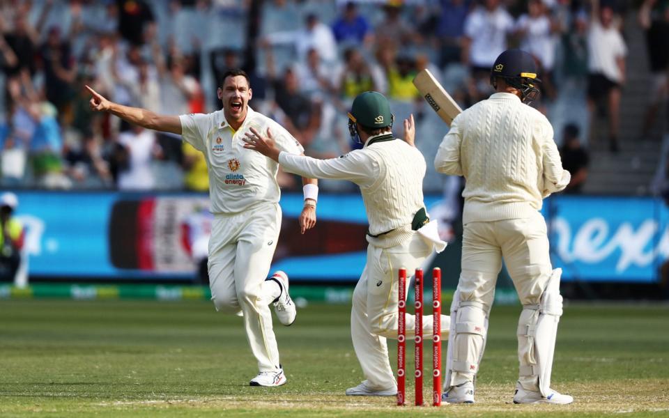 Scott Boland celebrates taking the wicket of Jack Leach  - PA