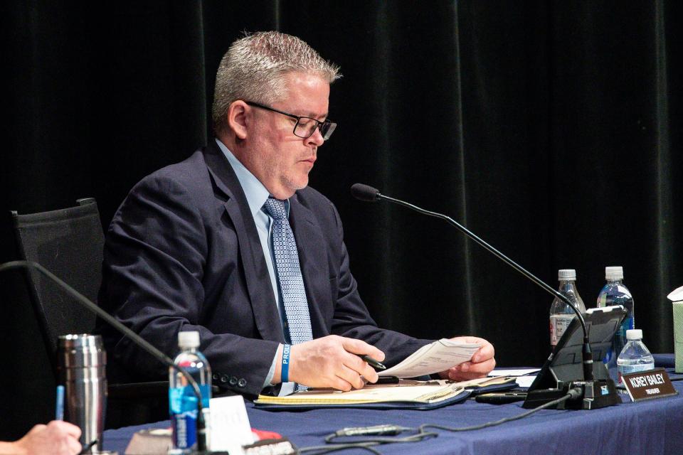 Oxford Community Schools Board of Education treasurer Korey Bailey during a Board of Education meeting at Oxford Middle School in Oxford on Dec. 14, 2021.