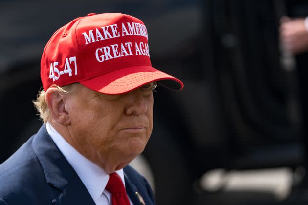 Former U.S. President Donald Trump speaks to the media as he arrives at the Atlanta Airport on April 10, 2024 in Atlanta, Georgia. (Photo by Megan Varner/Getty Images)