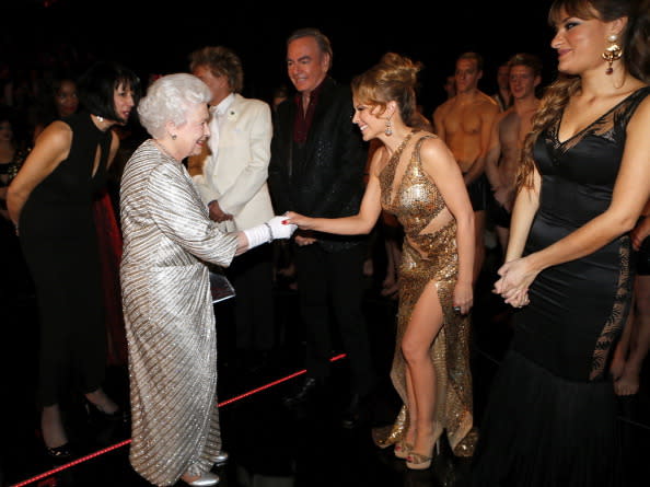 <p>Kylie went full on glitz and glam when she met the Queen. Could that leg split go any higher? <i>[Photo: Andrew Winning/WPA Pool/Getty Images]</i></p>