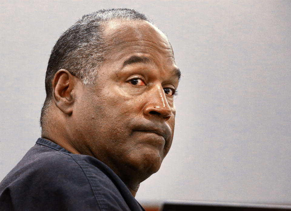 O.J. Simpson sits  during  an evidentiary hearing  in Clark County District Court  in Las Vegas, Nevada May 16, 2013. Simpson, who is currently serving a nine-to-33-year sentence in state prison as a result of his October 2008 conviction for armed robbery and kidnapping charges, is using a writ of habeas corpus, to seek a new trial, claiming he had such bad representation that his conviction should be reversed. REUTERS/Jeff Scheid/Pool/File Photo