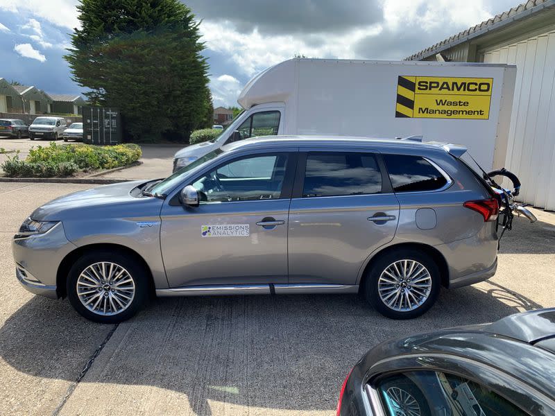 A Mitsubishi Outlander plug-in hybrid is pictured while undergoing tests by Emissions Analytics for a study on emissions by NGO Transport & Environment