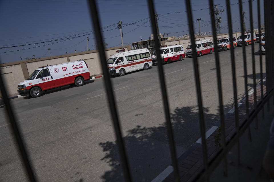 Ambulances with Palestinians wounded in the Israeli bombardment of the Gaza Strip arrive at Rafah border crossing to Egypt Wednesday, Nov. 1, 2023. (AP Photo/Fatima Shbair)