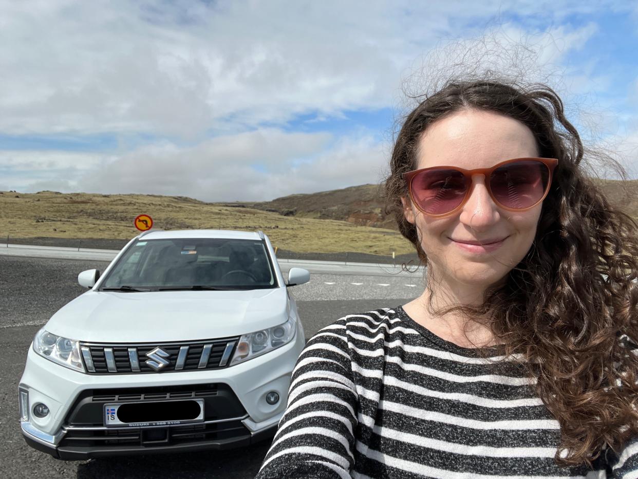 Talia Lakritz takes a selfie with a car in Iceland.