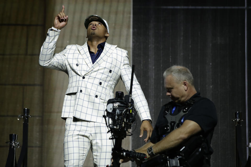 FILE - LSU's Jamal Adams reacts after being selected by the New York Jets during the first round of the NFL football draft April 27, 2017, in Philadelphia. Adams shined in a white windowpane patterned, double-breasted suit when he was taken at No. 6 by the Jets. (AP Photo/Matt Rourke, File)