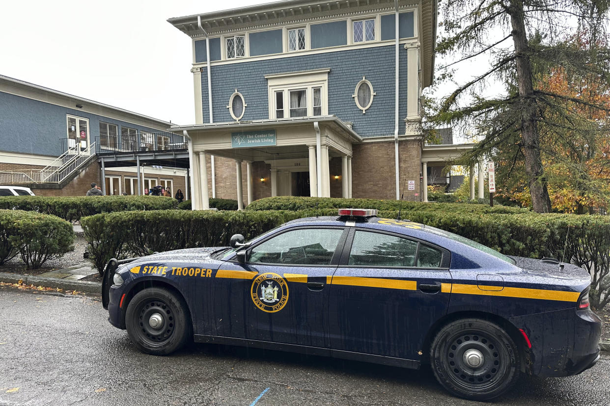 A state police cruiser is parked in front of Cornell University's Center for Jewish Living, in Ithaca, N.Y.