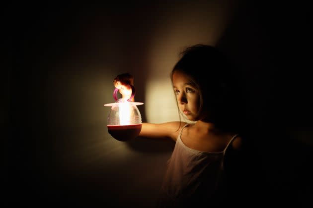 While being afraid of the dark is most common in children, it's still a common and evolutionary fear for many adults. (Photo: Donald Iain Smith via Getty Images)