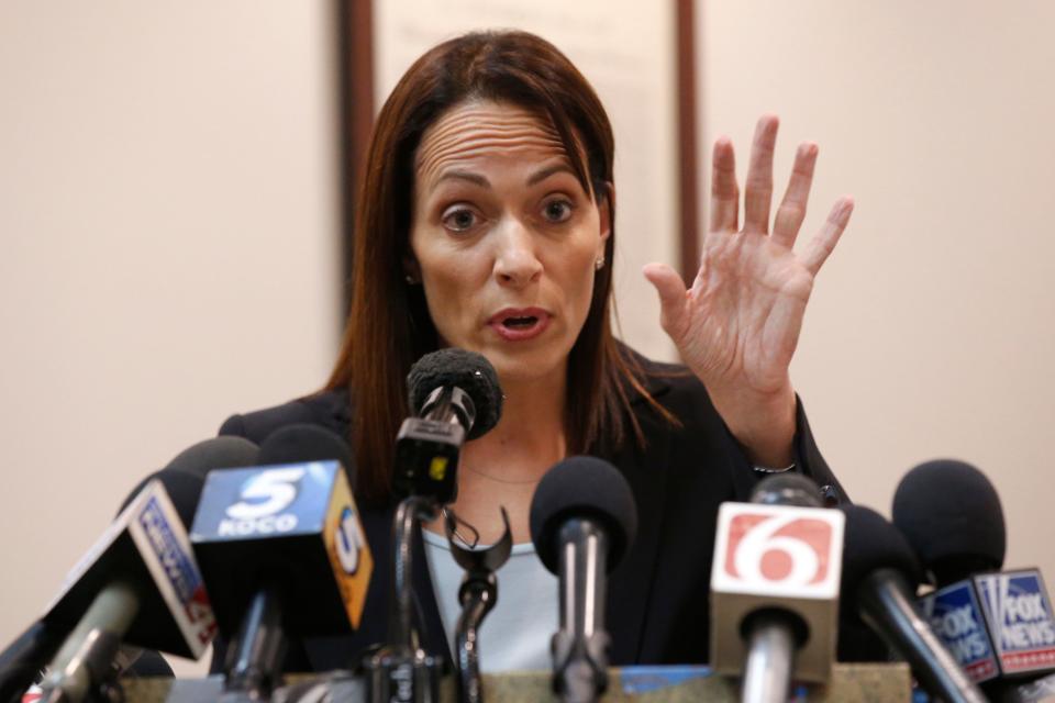 Sabrina Strong, an attorney for Johnson & Johnson and its subsidiaries, answers a question during a news conference following the announcement of the decision in in the Opioid Lawsuit in Norman, Okla., Monday, Aug. 26, 2019.