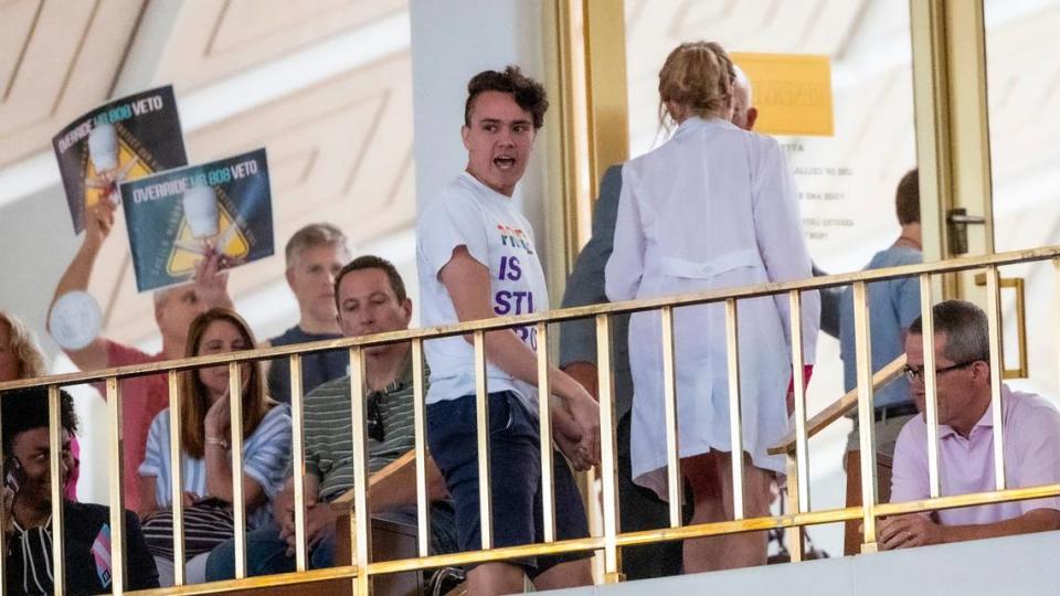 A demonstrator yells, “Protect trans kids.” following veto override votes in the House at the General Assembly in Raleigh on Wednesday, Aug 16, 2023.