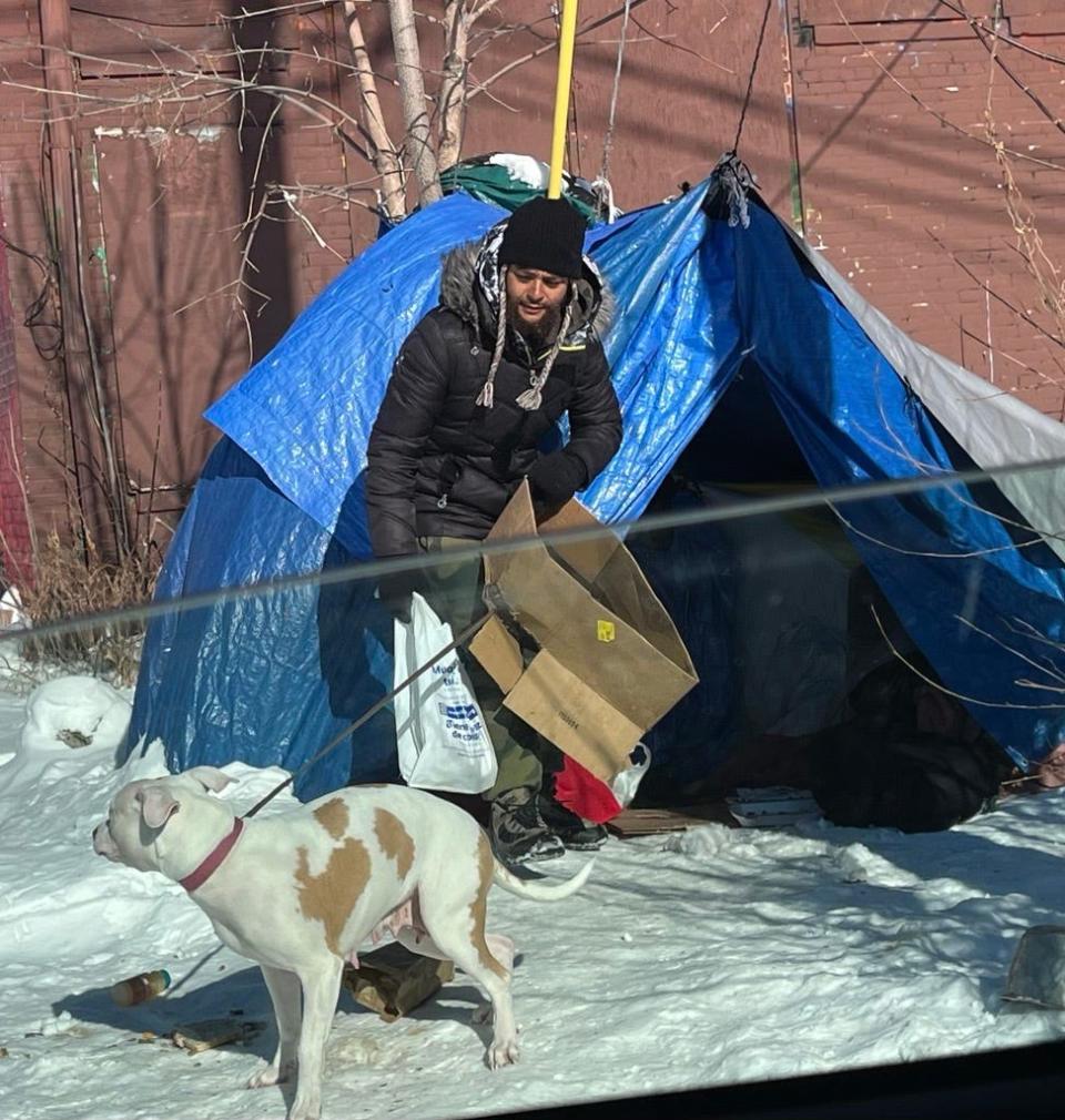 Samuel Sharpe Jr. and his dog, Ices