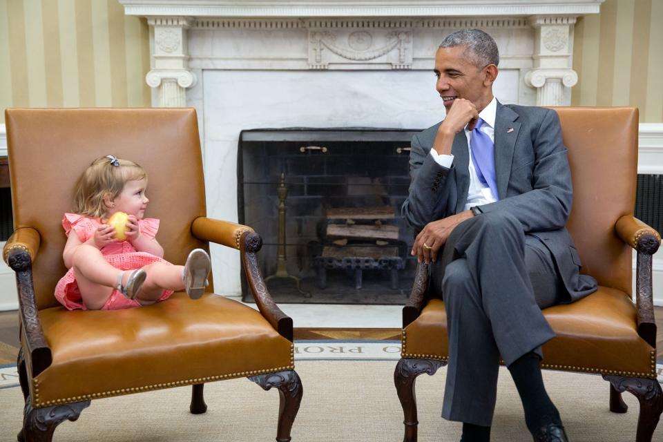 Obama chats with David Axelrod's granddaughter Maelin in the Oval Office on June 22.
