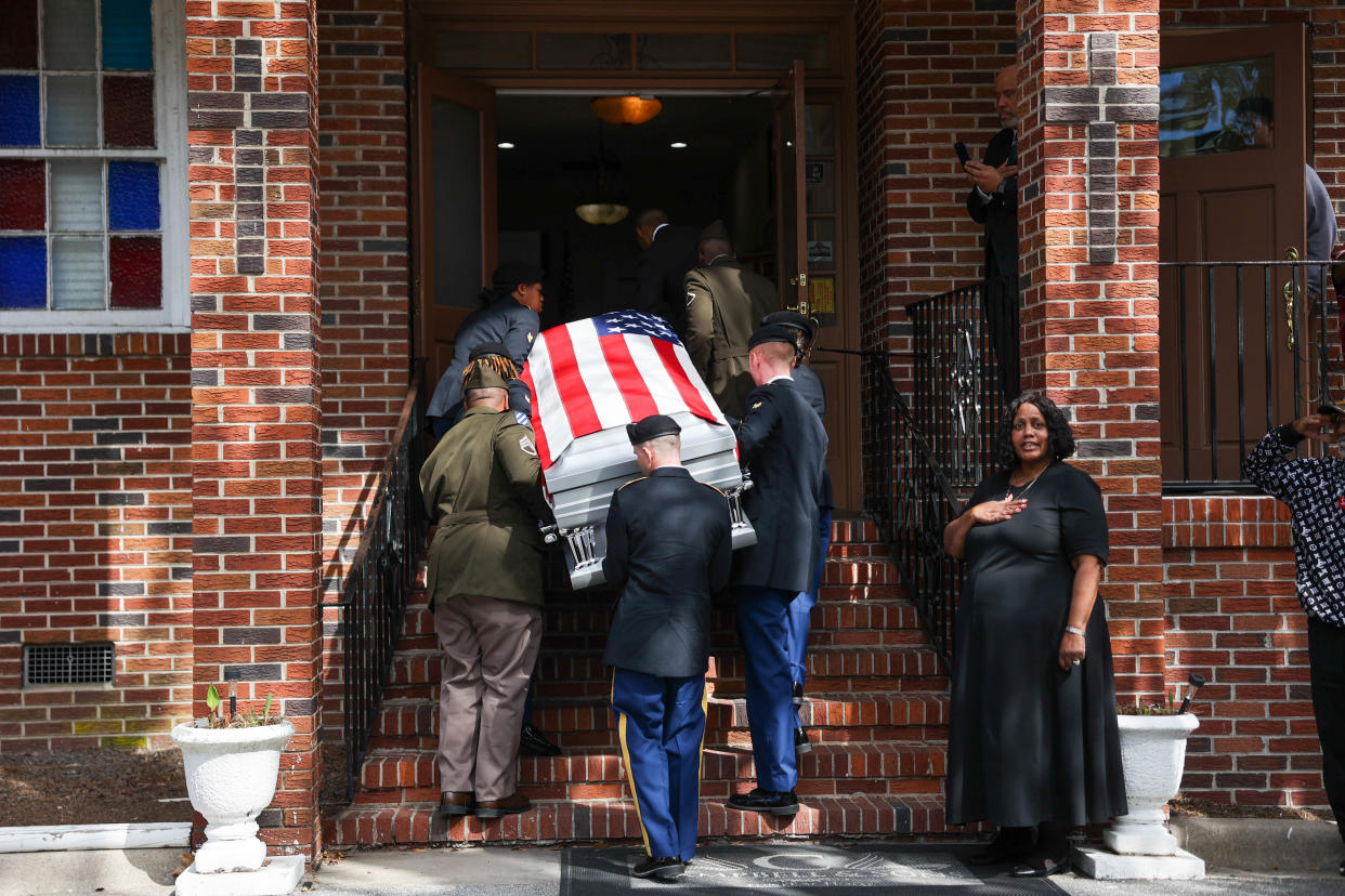 Body Bearers carry the remains of US Army Reservist Sgt. Breonna Moffett into Campbell and Sons Funeral Home in Savannah on Thursday.
