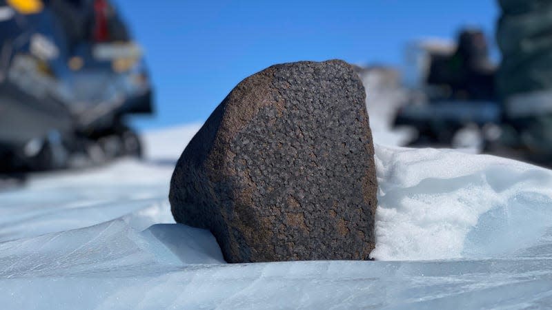 The 16.7 pound (7.6 kilogram) meteorite was found sitting on the surface of the Antarctic desert, where its black composition contrasted against the snow. 