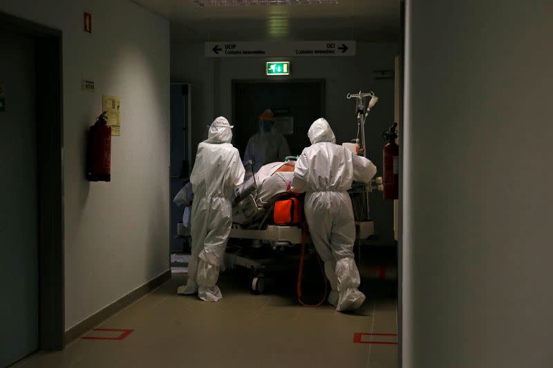 FILE PHOTO: A patient is carried to the COVID-19 Intensive Care Unit (ICU) of Cascais Hospital, amid the coronavirus disease (COVID-19) pandemic in Cascais