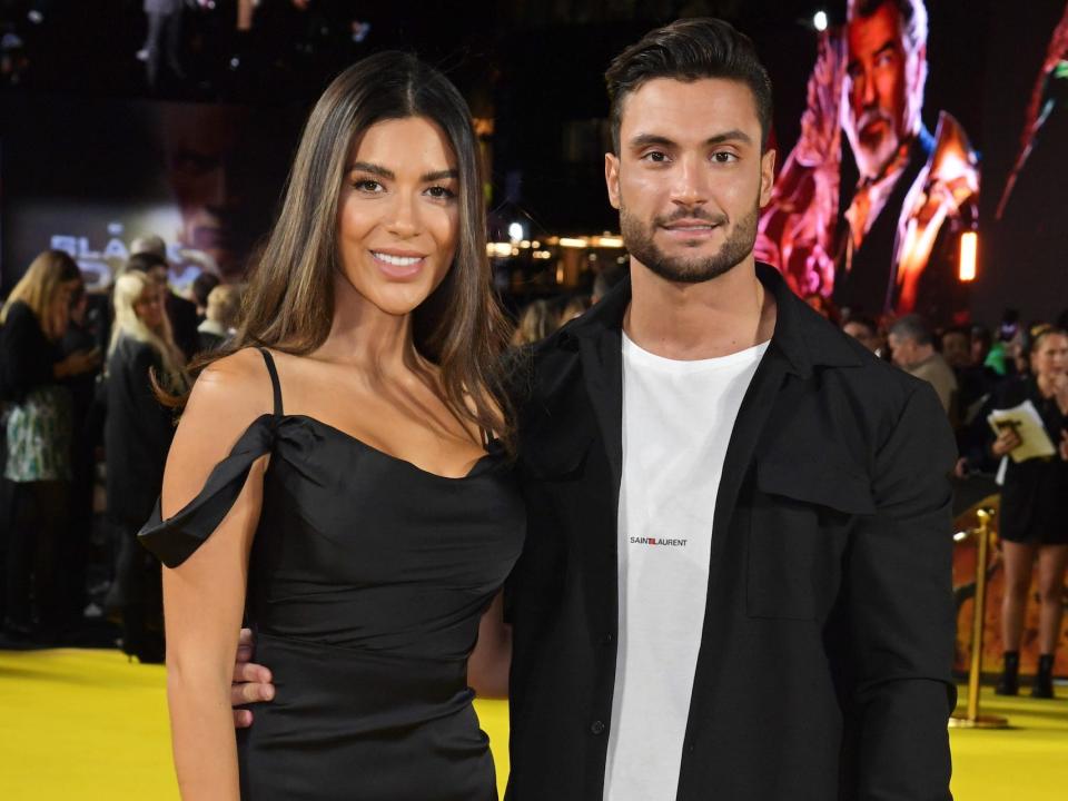 Ekin-Su and Davide Sanclimenti attend the UK Premiere of "Black Adam" at Cineworld Leicester Square on October 18, 2022 in London, England.