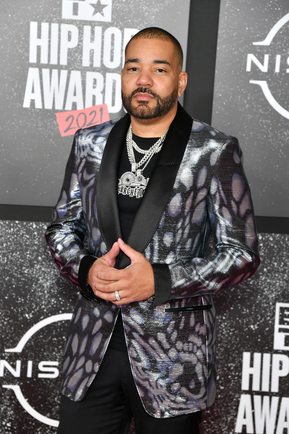 DJ Envy Wearing Suit