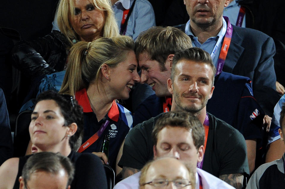 British cyclists Laura Trott and Jason Kenny during the Beach Volleyball on Day 12 of the London 2012 Olympic Games at Horse Guards Parade on August 8, 2012 in London, England. (Photo by Pascal Le Segretain/Getty Images)