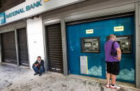 <strong>Bancos rescatados (3)</strong>: Banco Nacional de Grecia, Piraeus y Alpha Bank.<br><br> <strong>Coste para el Estado</strong>: 42.600 millones de euros.<br><br>(Foto: Valery Sharifulin / TASS / Getty Images).