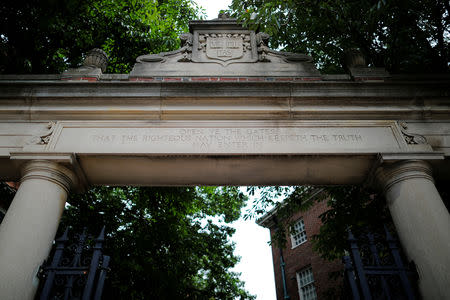 FILE PHOTO: One of the 25 gates to Harvard Yard is open at Harvard University in Cambridge, Massachusetts, U.S., June 18, 2018. REUTERS/Brian Snyder/File Photo