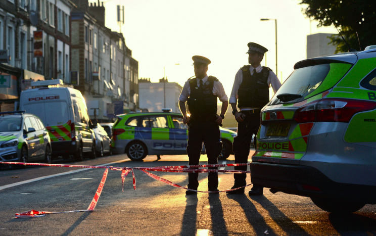 Police guard a cordon in Finsbury Park after the attack (Picture: PA)