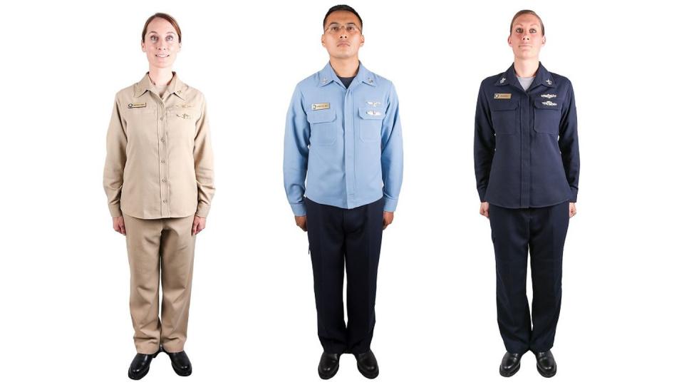 Sailors pose in three prototype versions of two-piece flame-resistant organizational clothing in May 2018. The Navy is starting to distribute 2POCs, and they will become more widely available next year. (MC2 Stacy M. Atkins Ricks/Navy)
