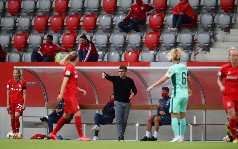 And again during it as social distancing was observed on the bench - GETTY IMAGES