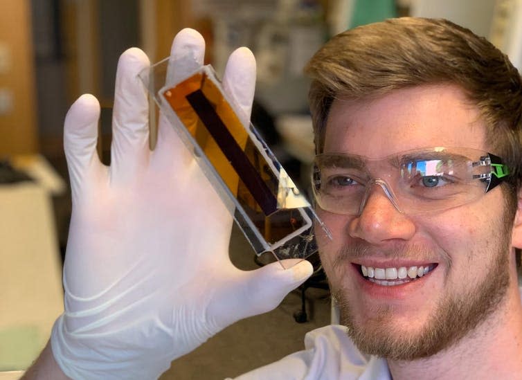 <span class="caption">Researcher Hannes Michaels holding a prototype zombie solar cell.</span> <span class="attribution"><span class="license">Author provided</span></span>