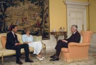 <p>The tones in the yellow drawing room were far more muted than the blues and pinks of Diana's sitting room, but still featured colorful accents, like porcelain roosters and a beautiful floral-patterned carpet. The giant tapestry made a great statement piece without being loud.</p>