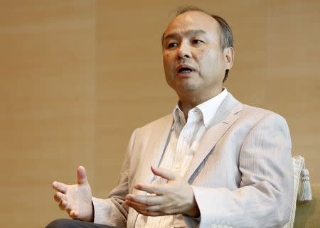 SoftBank Corp. Chief Executive Masayoshi Son speaks during a roundtable discussion with journalists at its headquarters in Tokyo June 17, 2014. REUTERS/Yuya Shino
