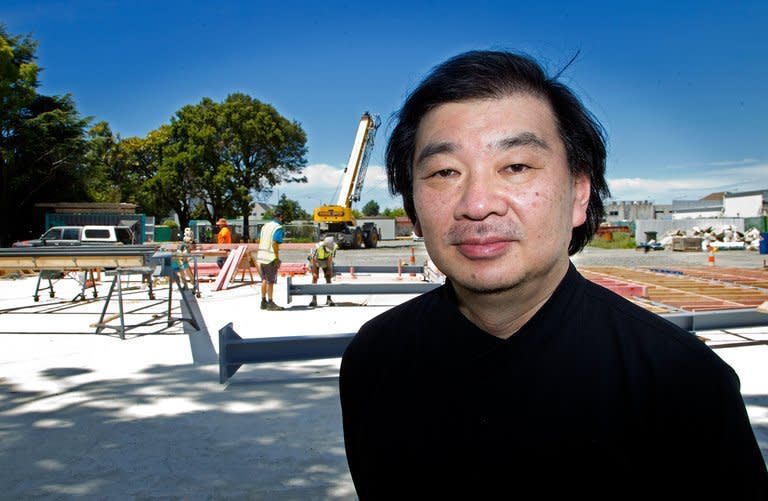 Japanese architect Shigeru Ban posing in front of the new Christchurch Cathedral building site on December 5, 2012. Built from 600-millimeter (24-inch) diameter cardboard tubes coated with waterproof polyurethane and flame retardants, it will be a simple A-frame structure that can hold 700 people