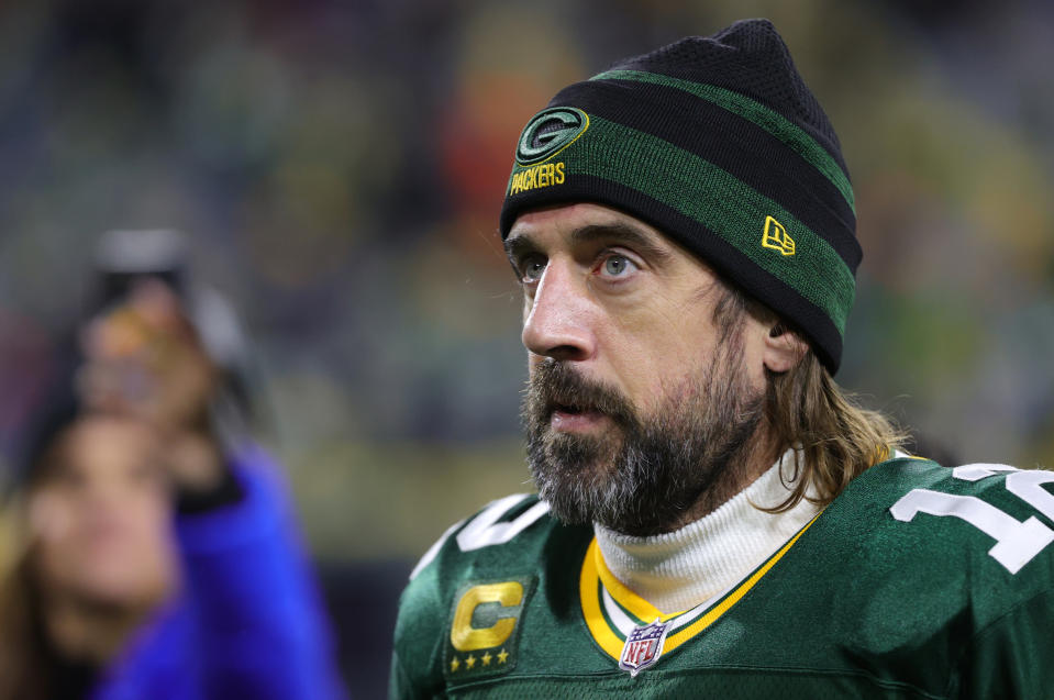 Aaron Rodgers #12 of the Green Bay Packers walks off the field after defeating the Los Angeles Rams 36-28 at Lambeau Field on November 28, 2021 in Green Bay, Wisconsin. (Photo by Stacy Revere/Getty Images)