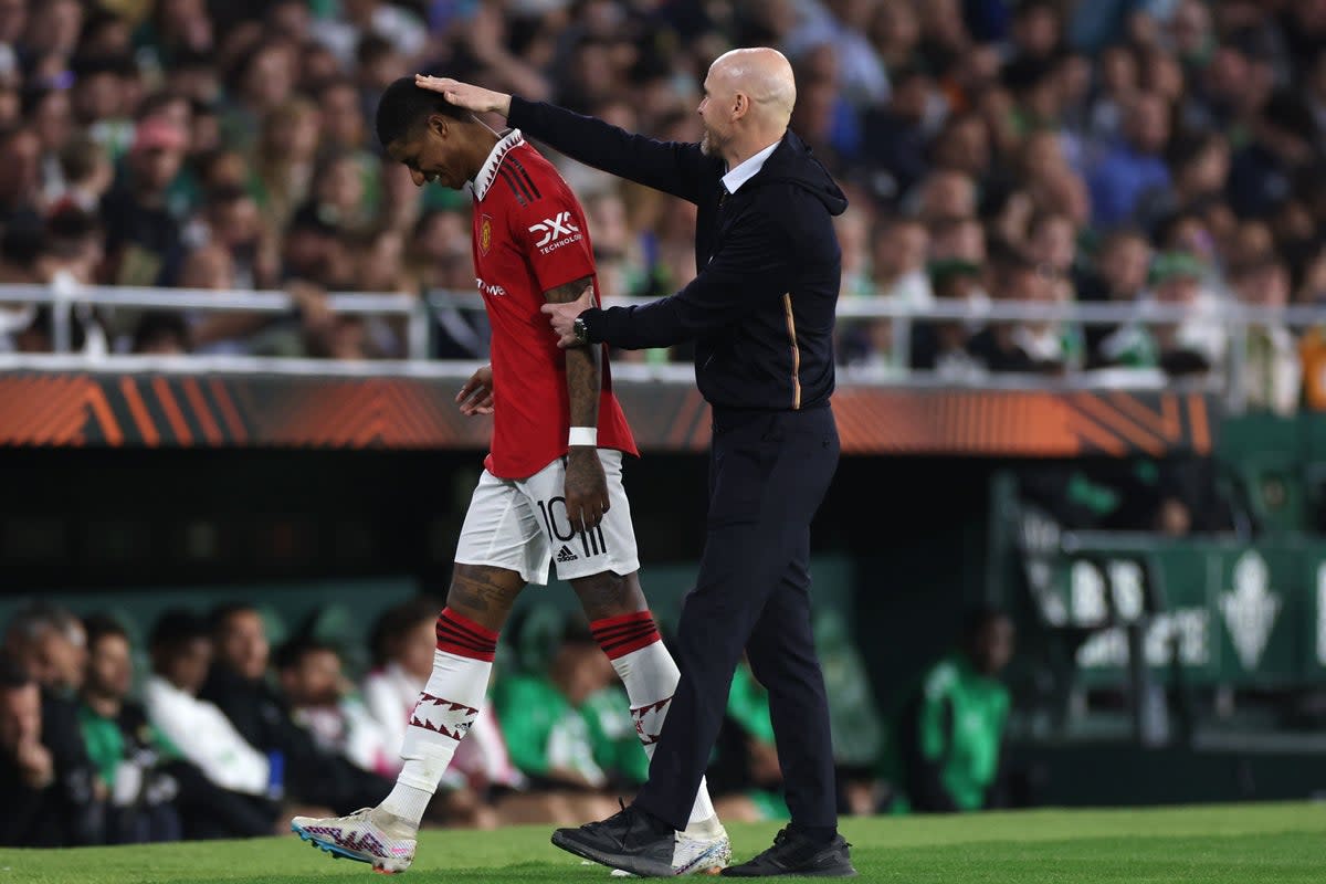 Manchester United’s Marcus Rashford (left) and manager Erik ten Hag (Isabel Infantes/PA) (PA Wire)