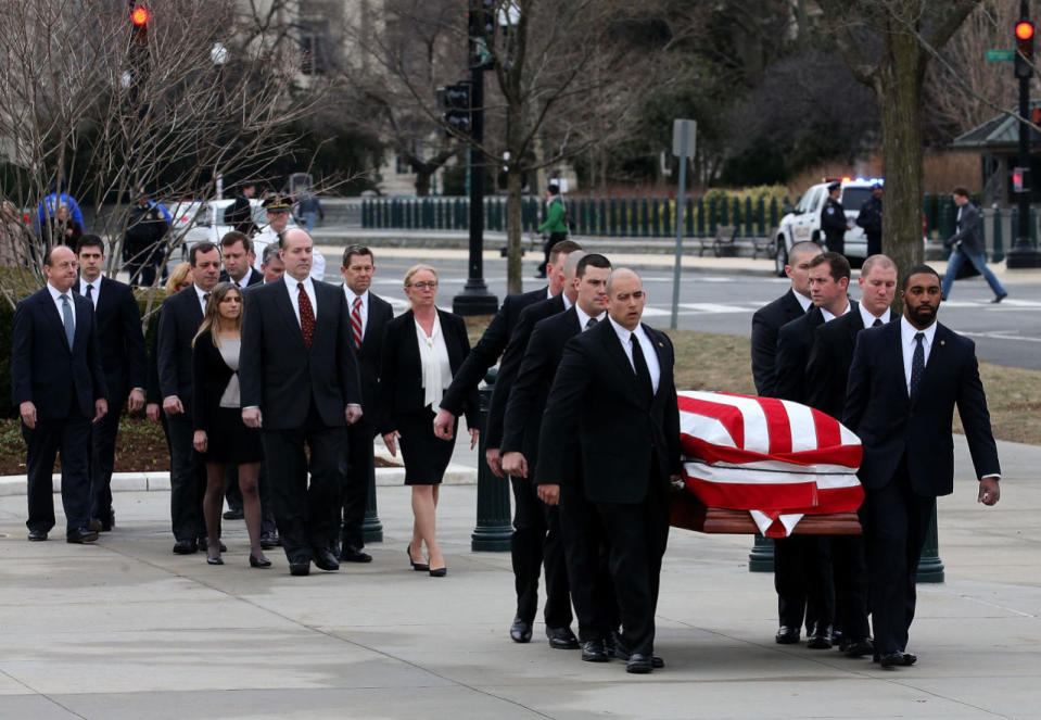 Pallbearers carry Justice Scalia 