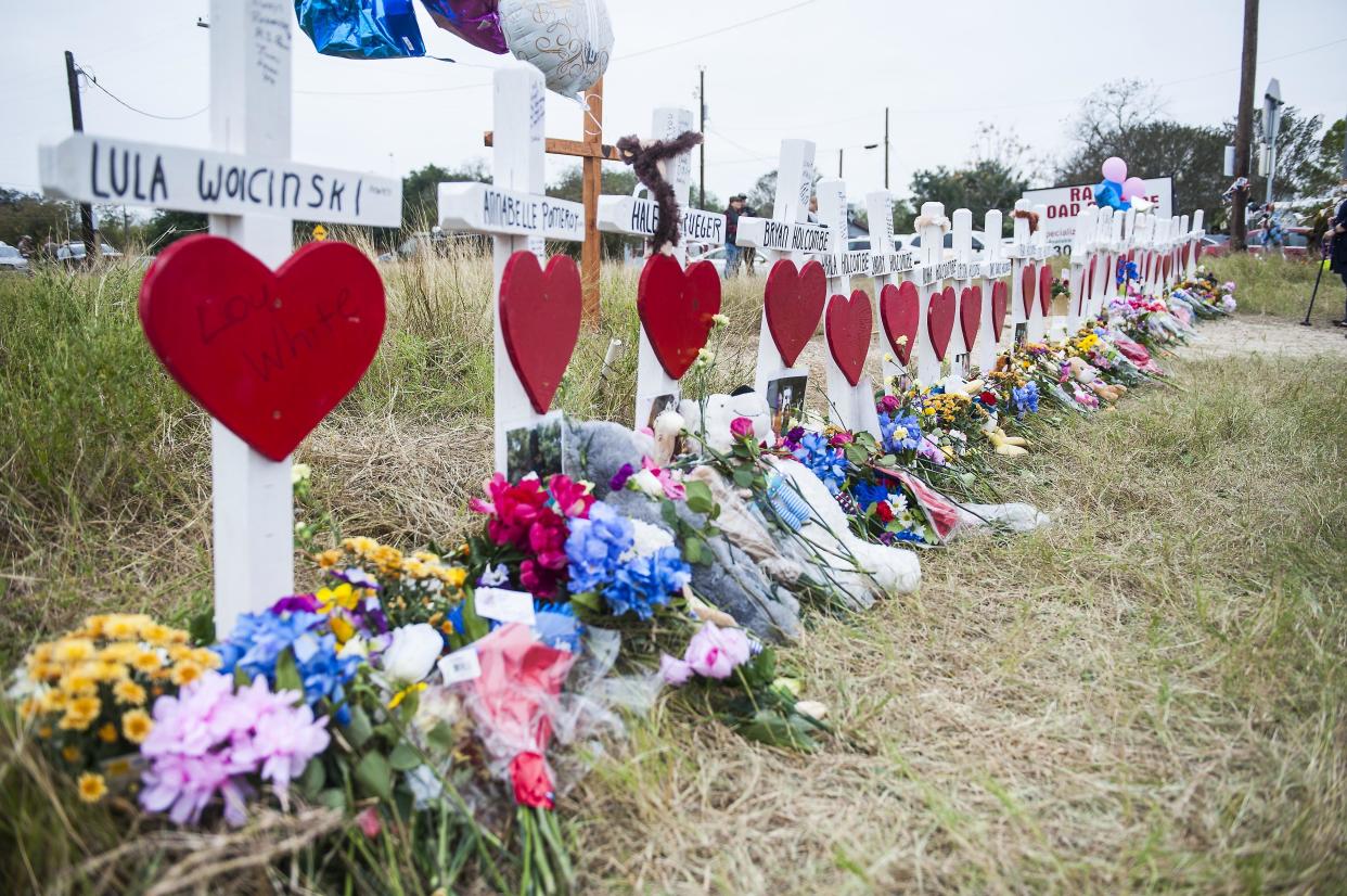 A memorial draws tributes to the victims of the mass shooting at First Baptist Church in Sutherland Springs, Texas, on Friday. (Photo: Laura Schimmel/Padre Ryan Photography for HuffPost)