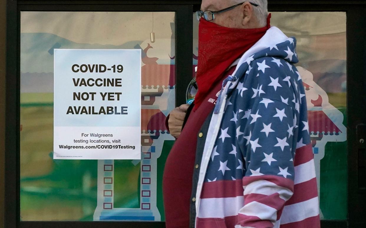 A sign outside a pharmacy in San Francisco. California is bracing for a wave of cases - AP