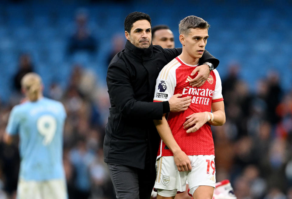 MANCHESTER, ENGLAND - MARCH 31: Mikel Arteta, Manager of Arsenal, interacts with Leandro Trossard of Arsenal following the Premier League match between Manchester City and Arsenal FC at Etihad Stadium on March 31, 2024 in Manchester, England. (Photo by Michael Regan/Getty Images) (Photo by Michael Regan/Getty Images)