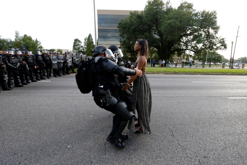 Ieshia Evans is detained by law enforcement on July 9, 2016, as she protests the shooting death of Alton Sterling near the headquarters of the Baton Rouge Police Department in Louisiana. (Photo: Jonathan Bachman / Reuters)