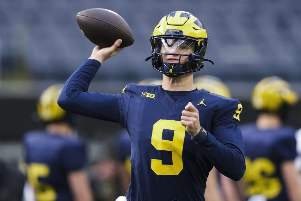 Michigan quarterback J.J. McCarthy throws during NCAA college football practice Saturday, Dec. 30, 2023, in Inglewood, Calif. Michigan is scheduled to play against Alabama on New Year's Day in the Rose Bowl, a semifinal in the College Football Playoff. (AP Photo/Ryan Sun)