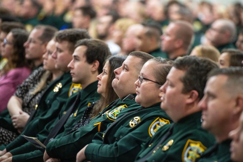 Officers are overcome with emotion during the Visitation and Celebration of Life for Okaloosa Deputy Ray Hamilton at Destin-Fort Walton Beach Convention Center Saturday, December 31, 2022. Deputy Hamilton was killed in the line of duty December 24, 2022.