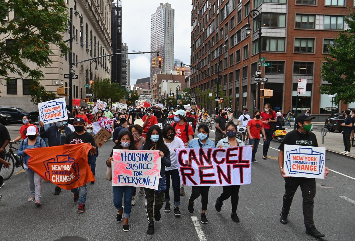 Protestors demonstrate during a 'No Evictions, No Police' national day of action protest against law enforcement who forcibly remove people from homes on September 1, 2020 in New York City. - Activists and relief groups in the United States are scrambling to head off a monumental wave of evictions nationwide, as the coronavirus crisis leaves tens of millions at risk of homelessness. (Photo by Angela Weiss / AFP) (Photo by ANGELA WEISS/AFP via Getty Images)