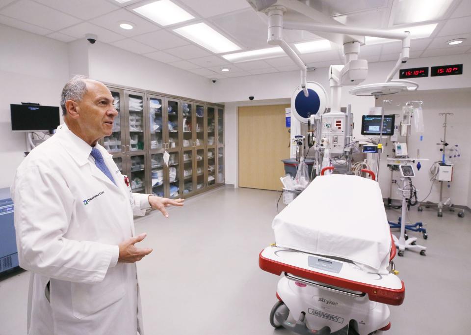 Dr. Farid Muakkassa, head of trauma at Cleveland Clinic Akron General Emergency Department, describes how a gunshot is treated in one of the four trauma rooms in the emergency department in Akron.