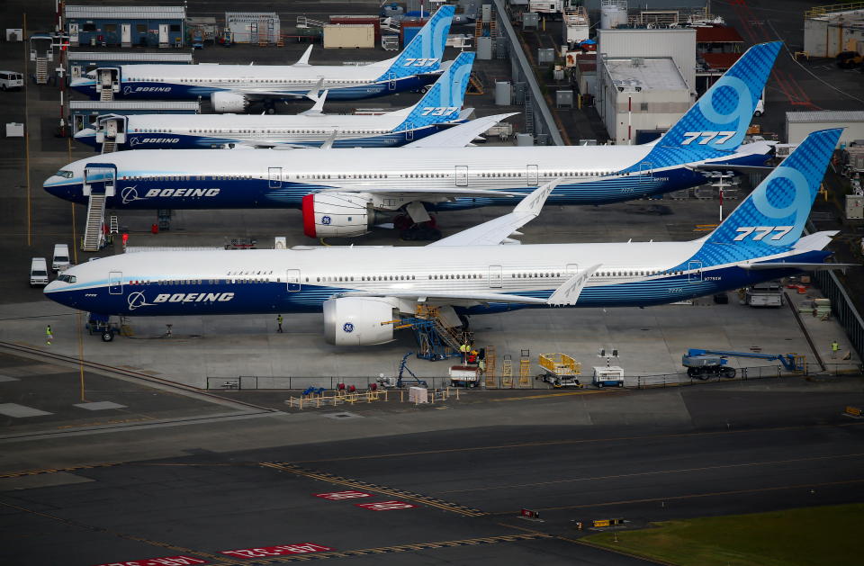 Boeing 777X and Boeing 737 MAX 10 airplanes are seen parked in an aerial view at King County International Airport-Boeing Field in Seattle, Washington, U.S, June 1, 2022.  REUTERS/Lindsey Wasson